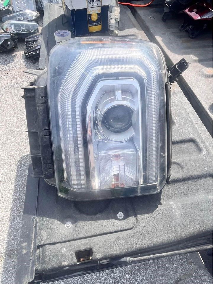 Headlamp Assembly used genuine OEM General Motors Sierra 1500 Pickup 2016-2019