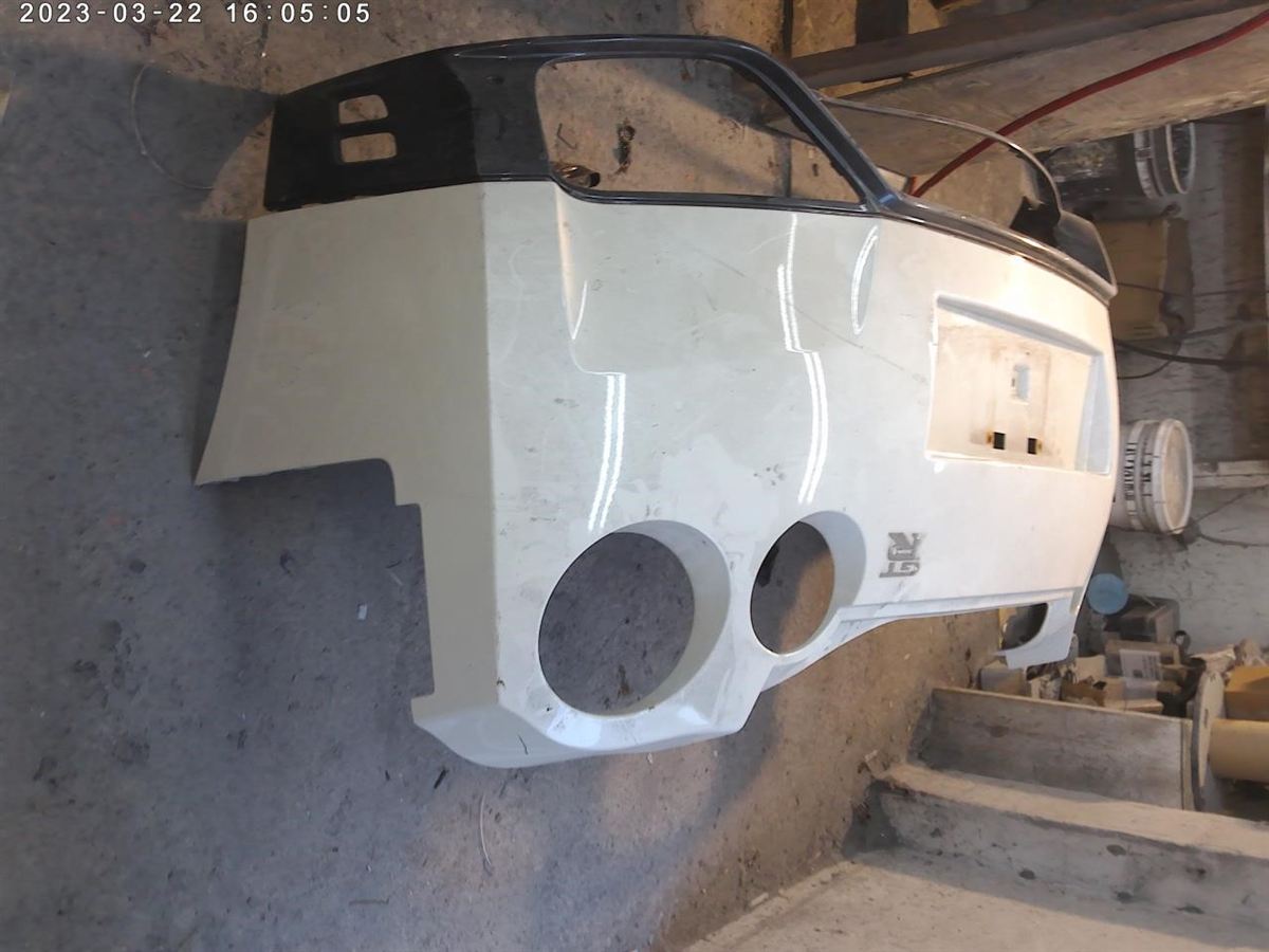 Defensa (parachoques) trasera usada original (OEM) Nissan GT-R 2012-2016