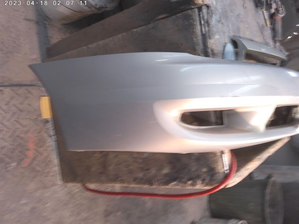 Front bumper cover used genuine OEM Saturn L100 2001-2002