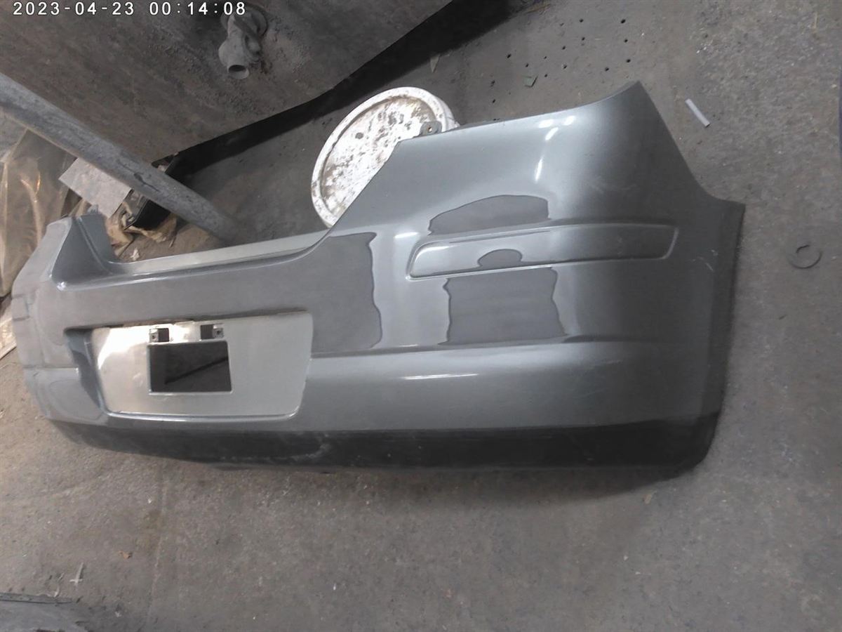 Rear bumper cover used genuine OEM Nissan Versa 2007-2012