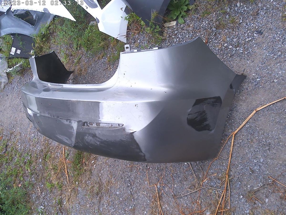 Rear bumper cover used genuine OEM Mazda 3 2012-2013