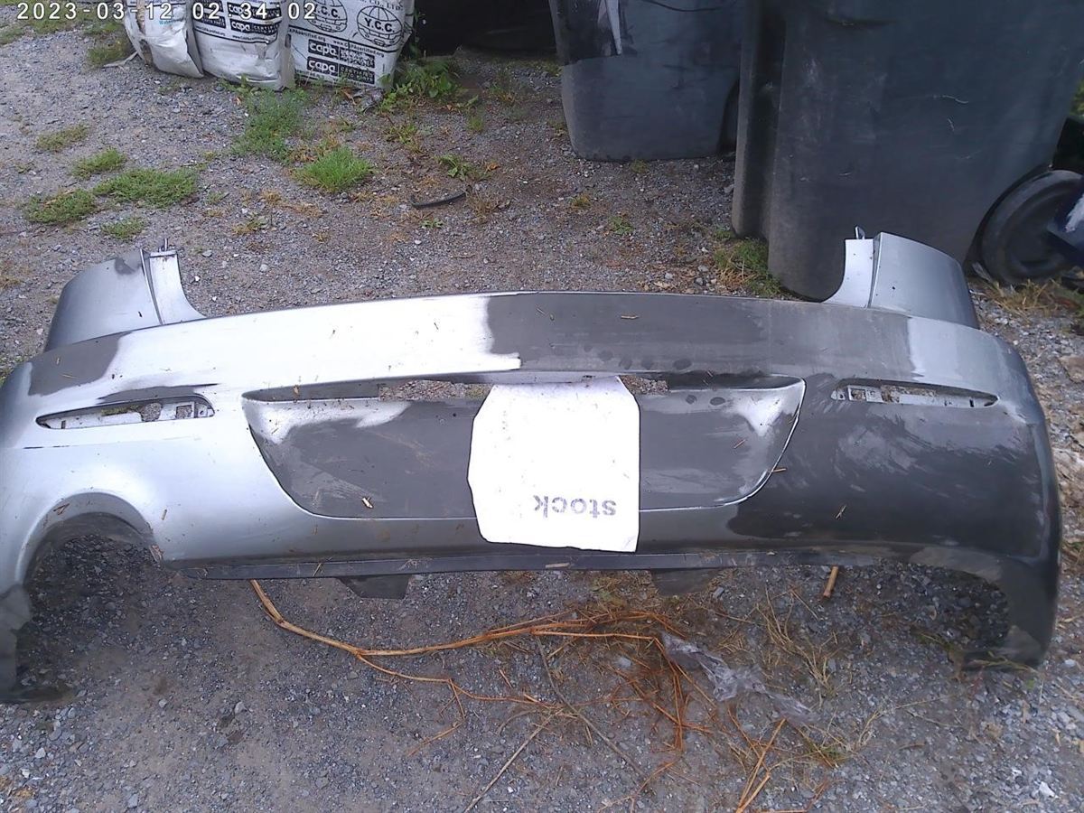 Rear bumper cover used genuine OEM Mazda 3 2012-2013
