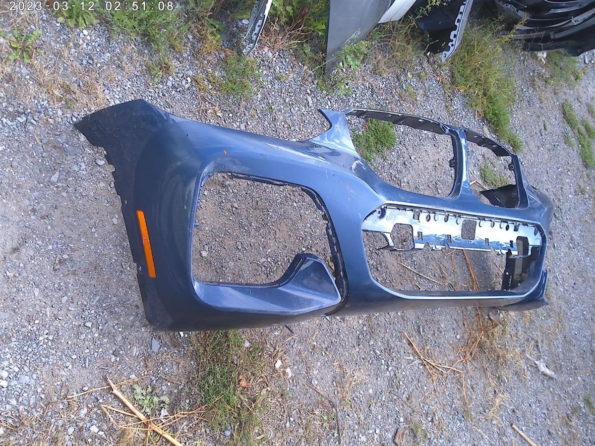 Front bumper cover used genuine OEM BMW X3 2018-2021