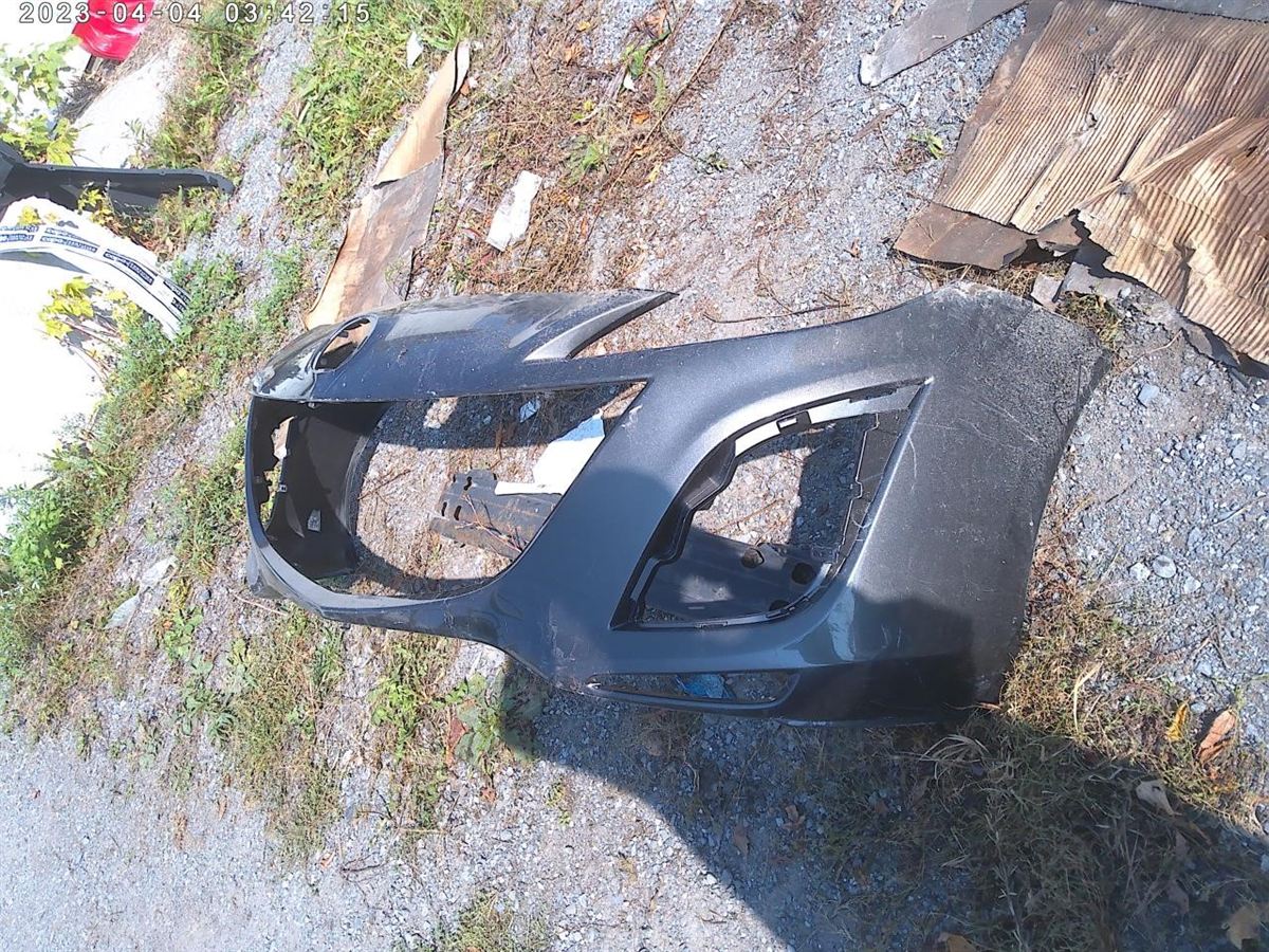 Front bumper cover used genuine OEM Mazda 3 2010-2011