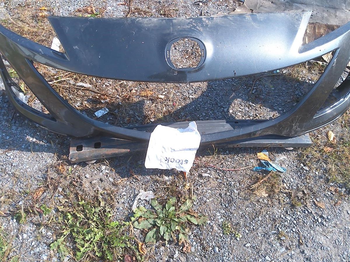 Front bumper cover used genuine OEM Mazda 3 2010-2011