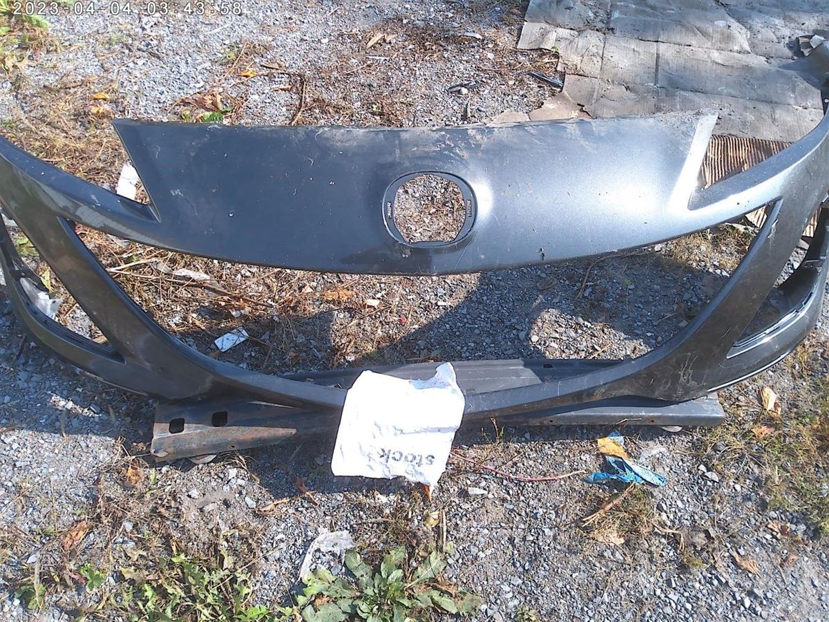 Front bumper cover used genuine OEM Mazda 3 2010-2011