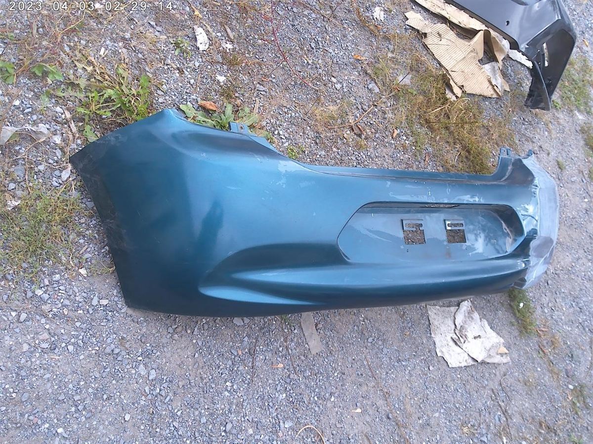 Defensa (parachoques) trasera usada original (OEM) Nissan Micra 2015-2019