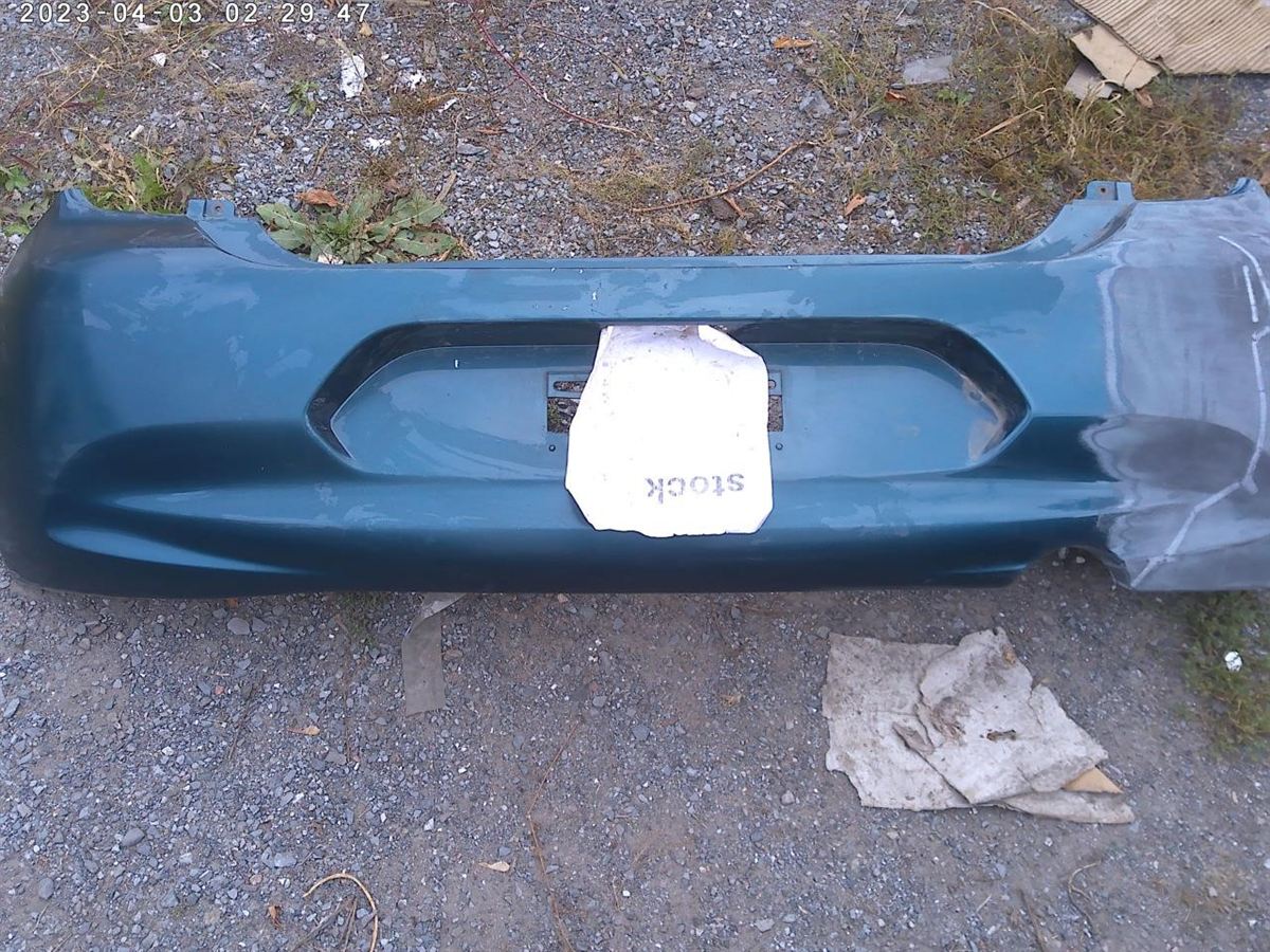 Defensa (parachoques) trasera usada original (OEM) Nissan Micra 2015-2019