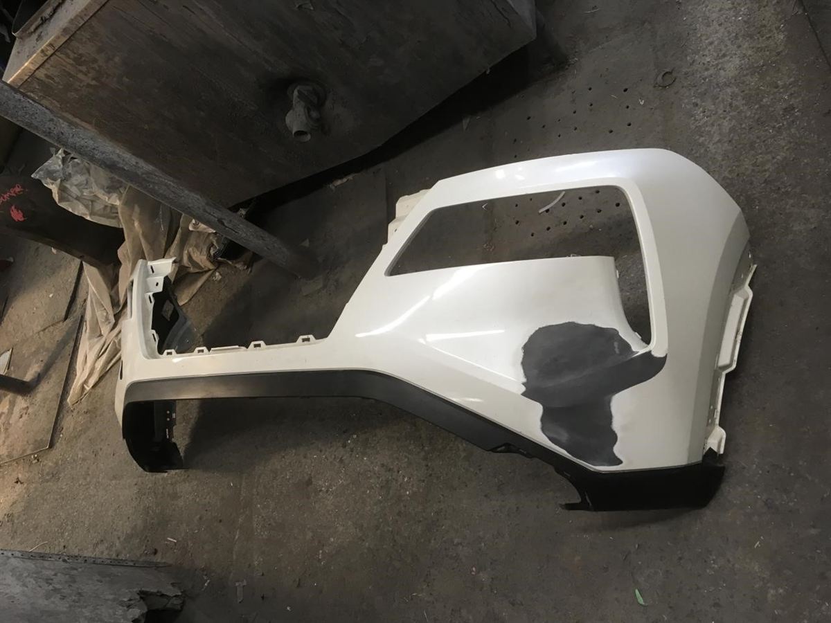 Front bumper cover used genuine OEM Nissan Rogue 2021-2023