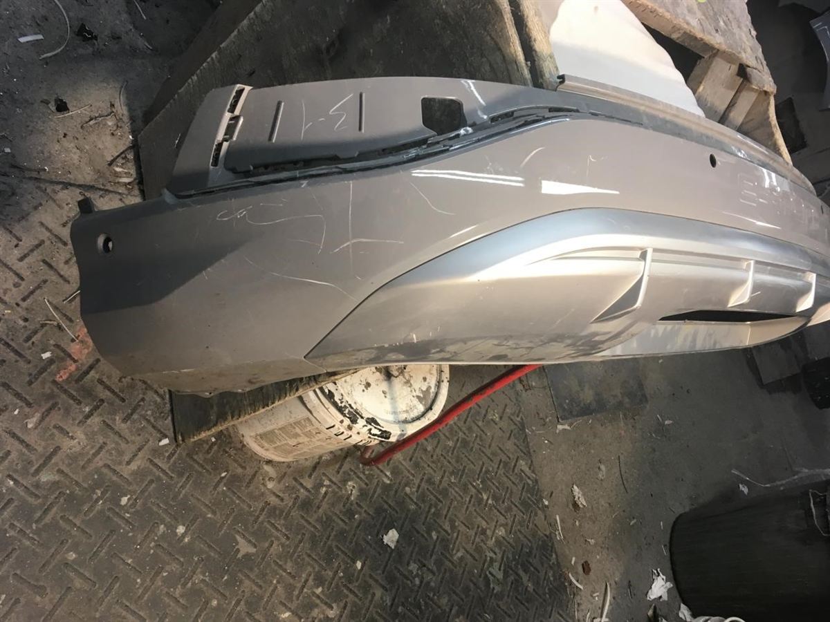Rear Bumper assembly used genuine OEM