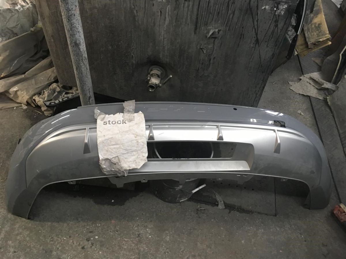 Rear Bumper assembly used genuine OEM