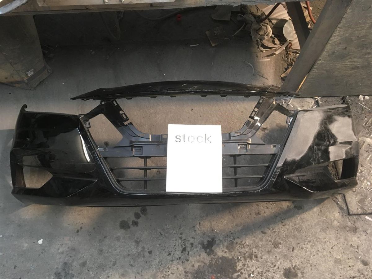 Front bumper cover used genuine OEM Nissan Versa 2020-2022