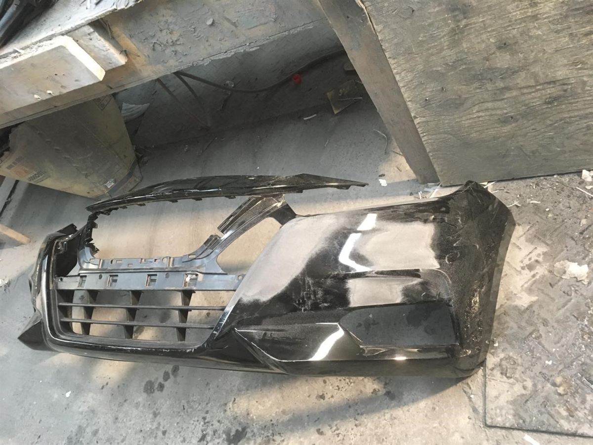 Left front bumper insert used genuine OEM Nissan Versa 2020-2022