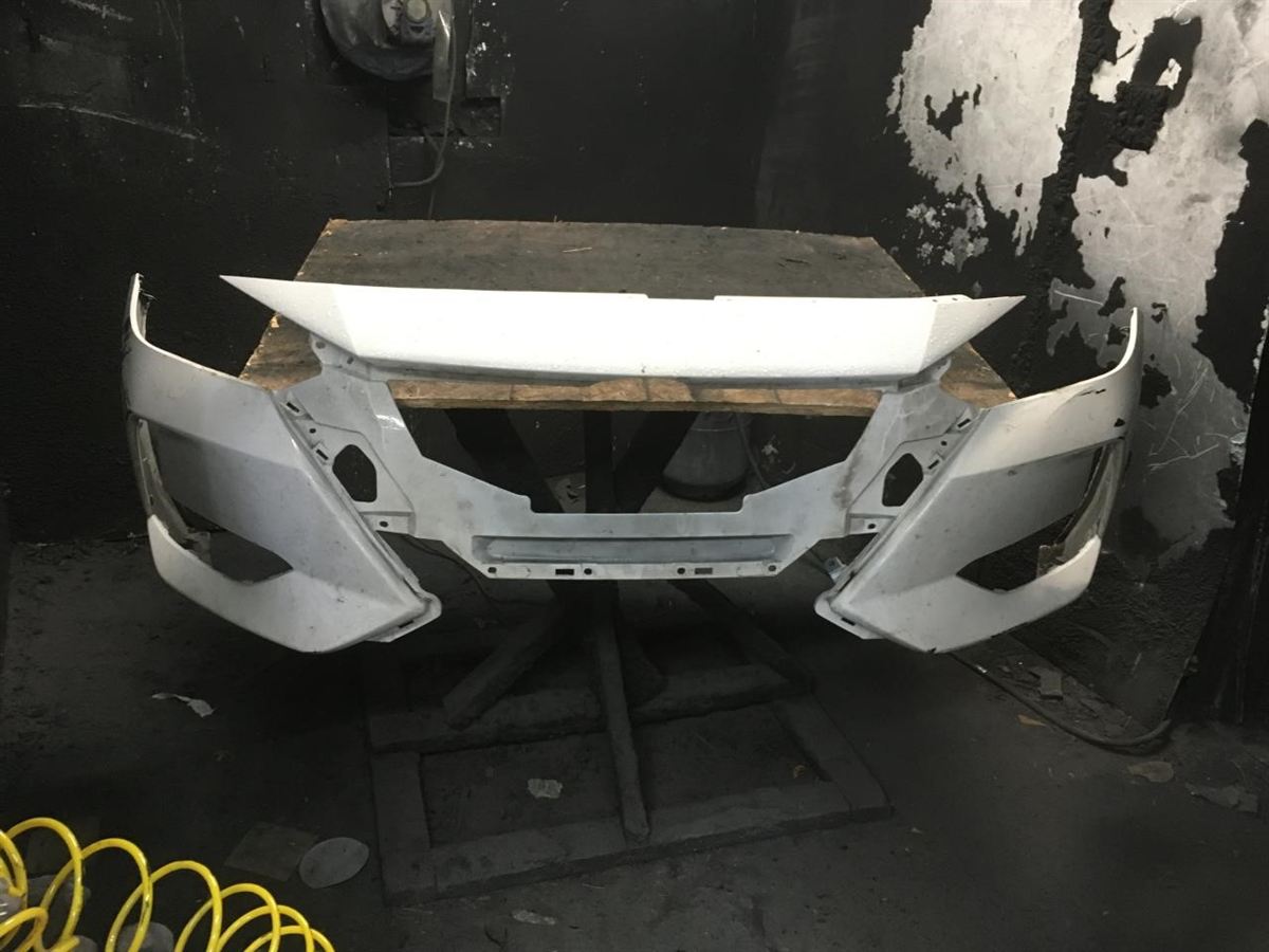 Front bumper cover used genuine OEM Nissan Sentra 2020-2023