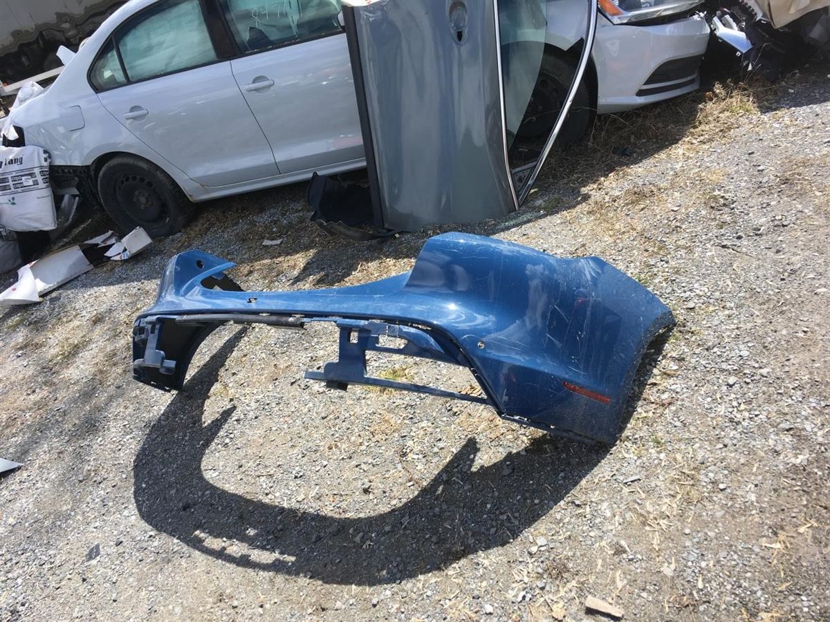 Rear Bumper assembly used genuine OEM