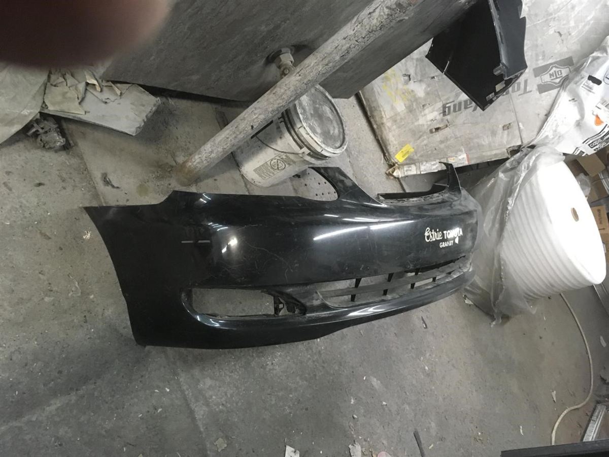 Left front bumper insert used genuine OEM Toyota Corolla 2003-2004
