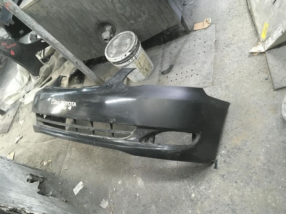 Left front bumper insert used genuine OEM Toyota Corolla 2003-2004
