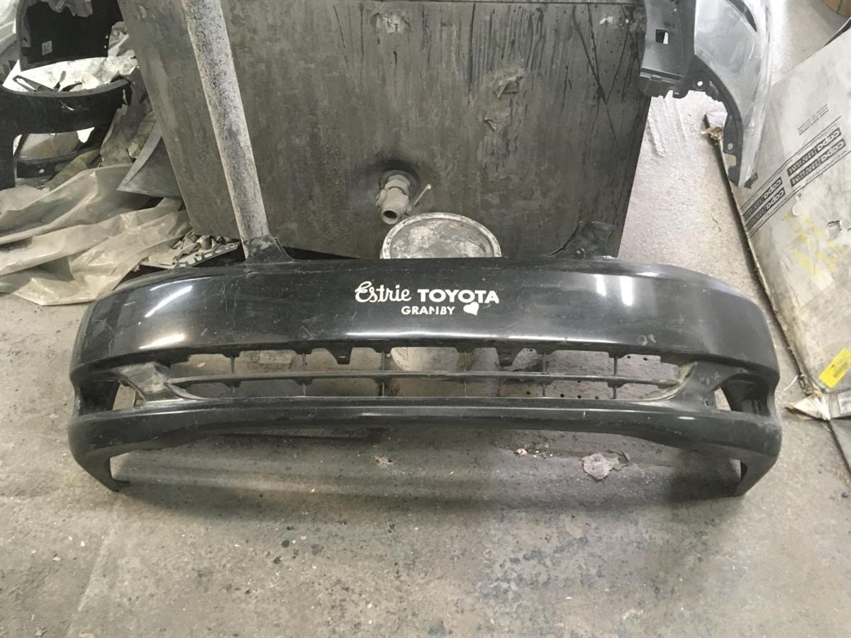 Left front bumper insert used genuine OEM Toyota Corolla 2003-2004