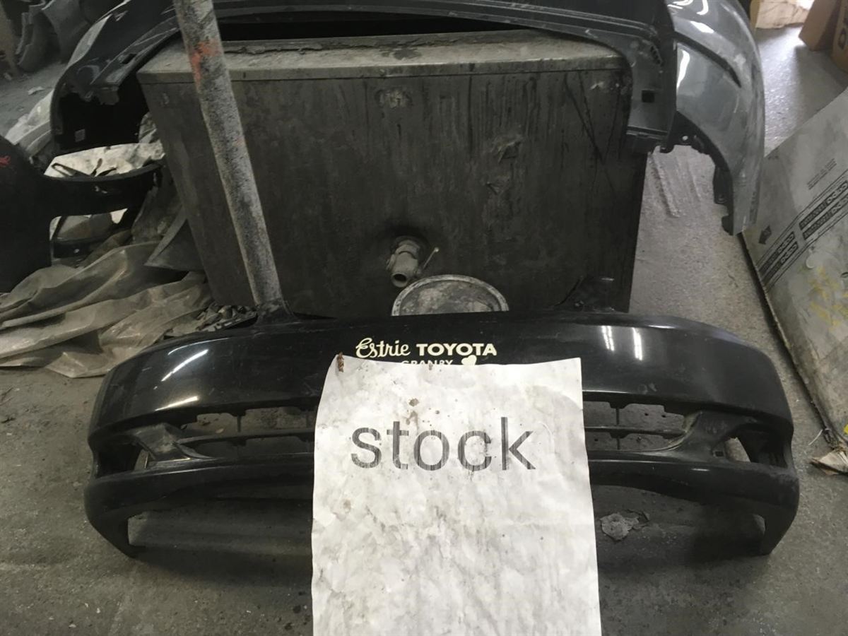 Left front bumper insert used genuine OEM Toyota Corolla 2003-2004
