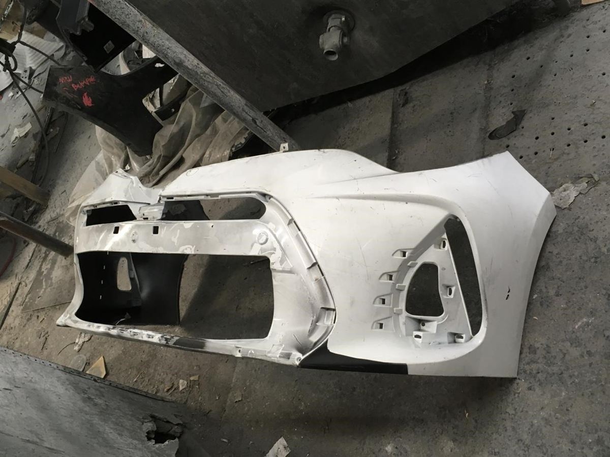 Front bumper cover used genuine OEM Toyota Corolla 2017-2019