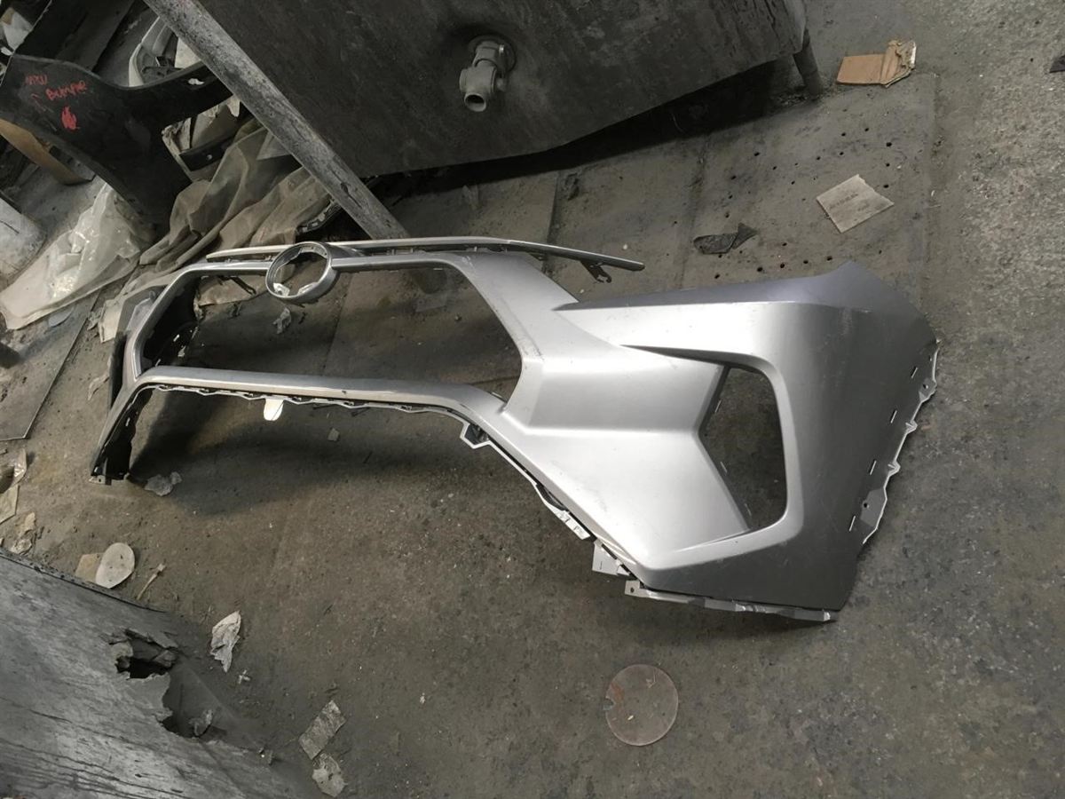 Front bumper cover used genuine OEM Toyota RAV4 2019-2025