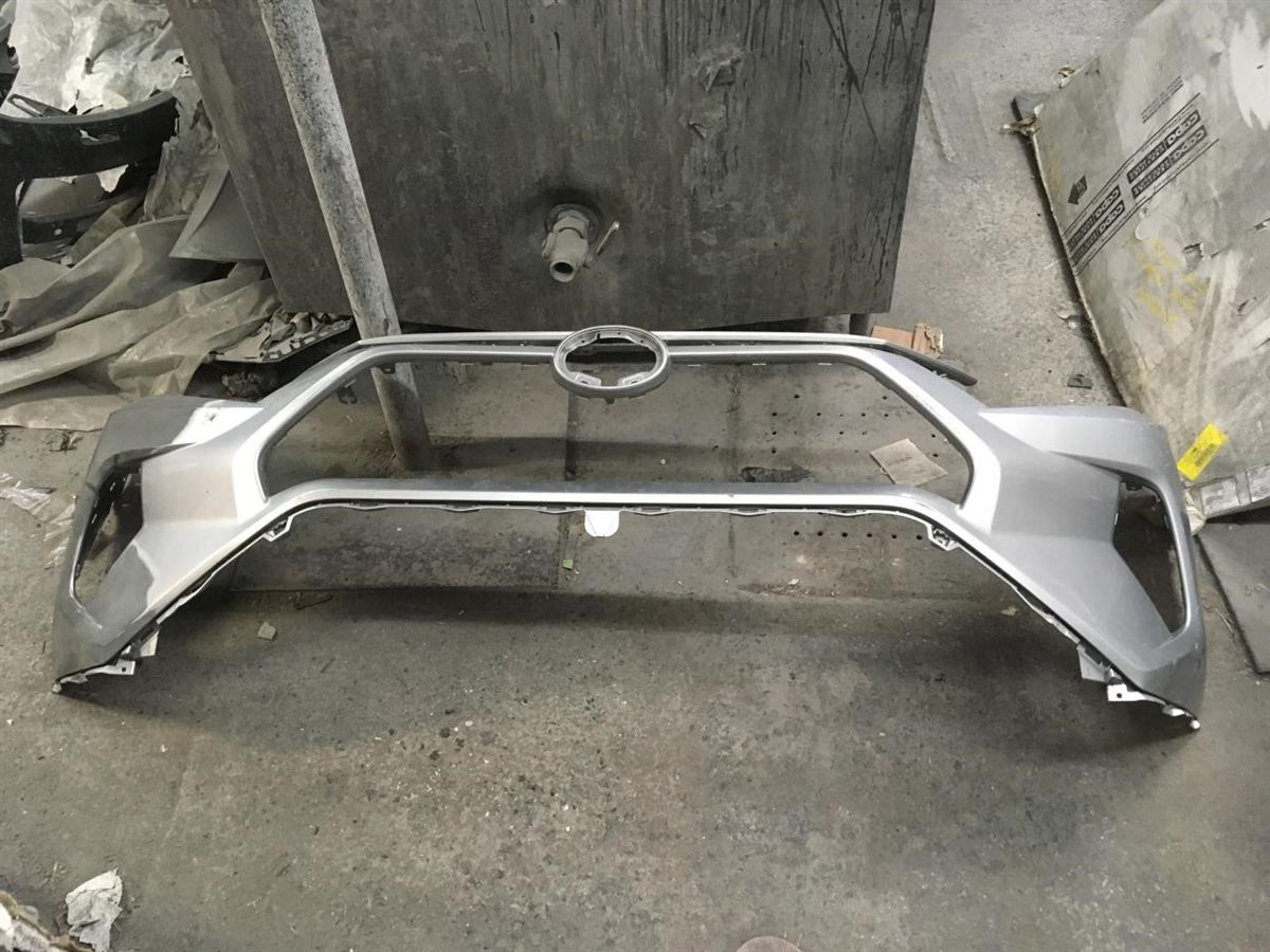 Front bumper cover used genuine OEM Toyota RAV4 2019-2025