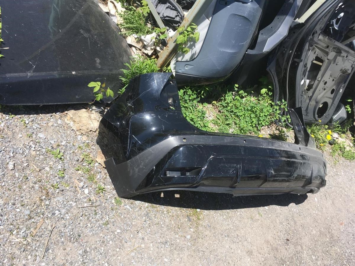 Rear bumper cover used genuine OEM Nissan Kicks 2021-2024