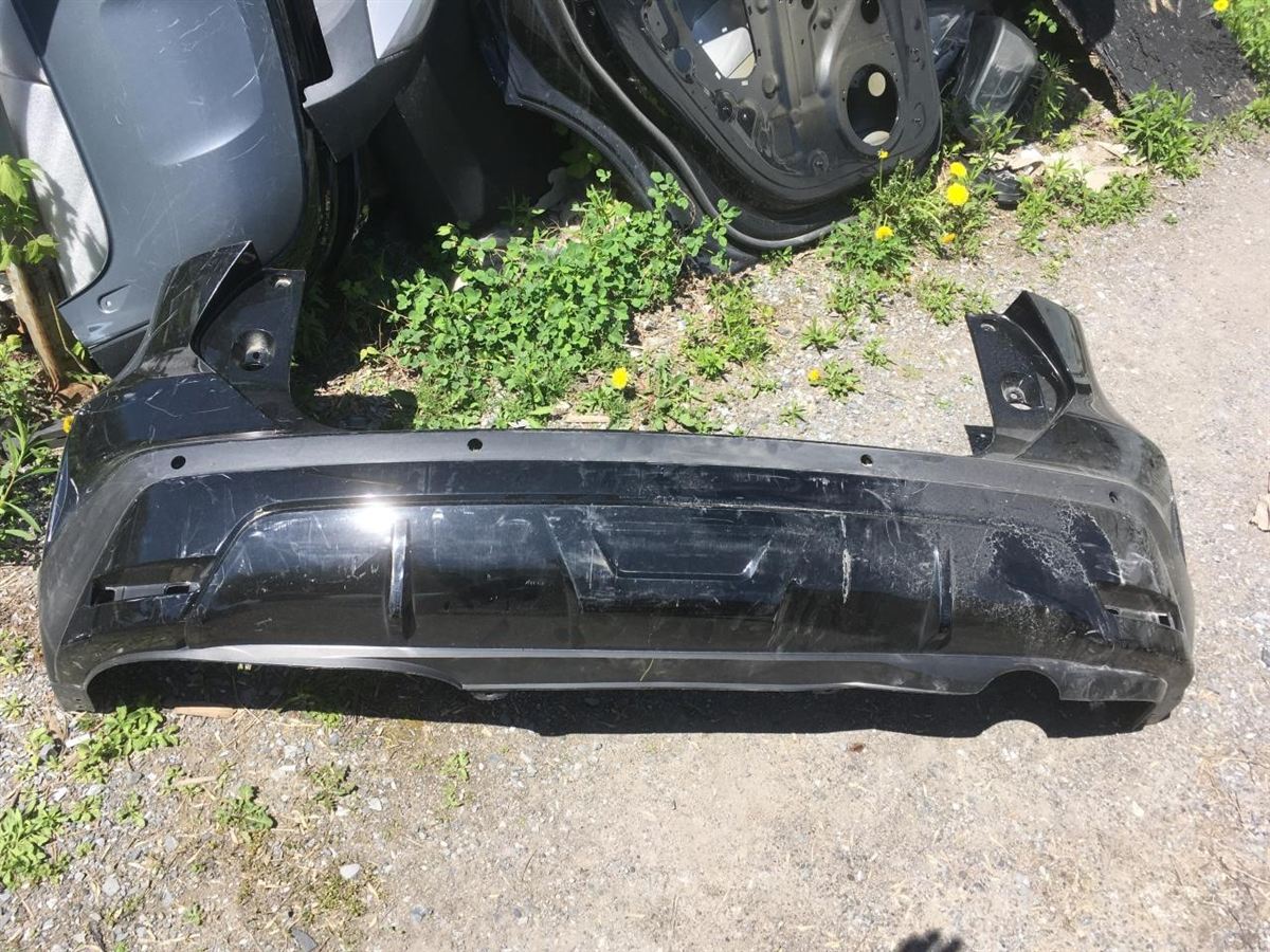 Rear bumper cover used genuine OEM Nissan Kicks 2021-2024