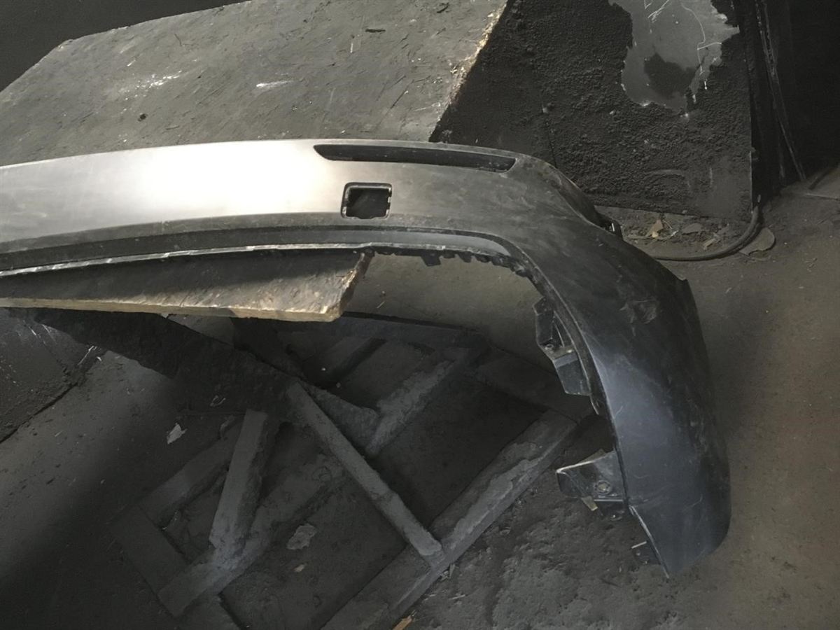 Defensa (parachoques) trasera izquierda usada original (OEM) Mazda CX-50 2023-2025