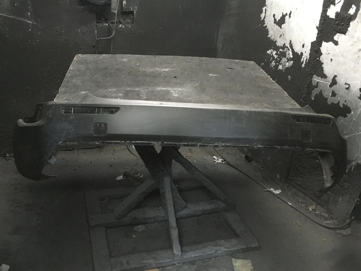 Defensa (parachoques) trasera izquierda usada original (OEM) Mazda CX-50 2023-2025