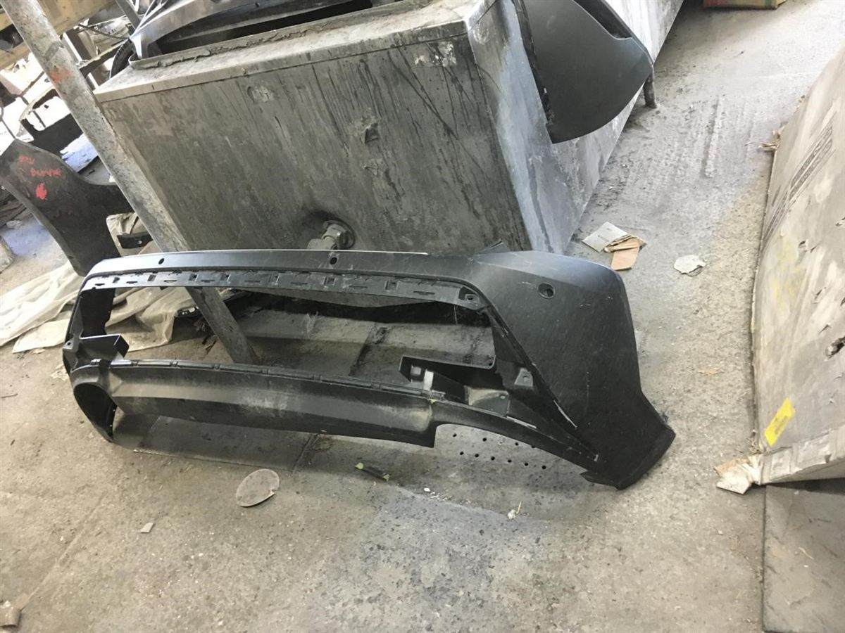 Rear bumper cover used genuine OEM Nissan Rogue 2021-2023