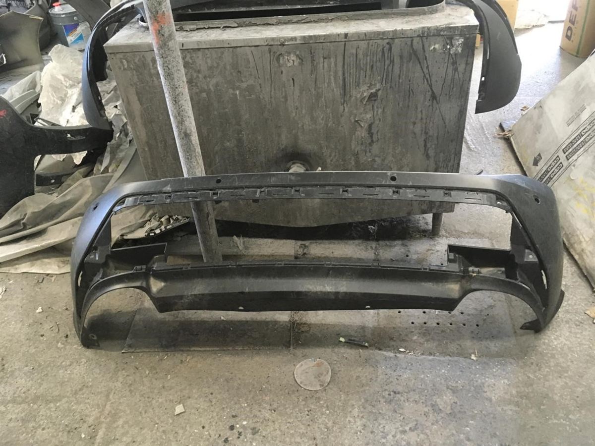 Rear bumper cover used genuine OEM Nissan Rogue 2021-2023