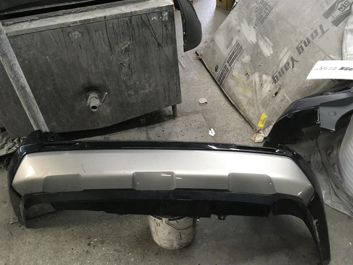 Rear bumper cover used genuine OEM Toyota RAV4 2019-2025