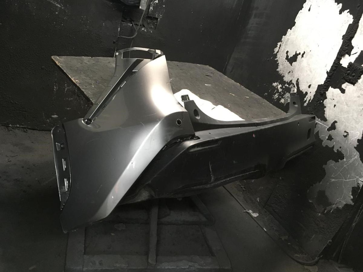 Rear bumper cover used genuine OEM Toyota RAV4 2019-2025