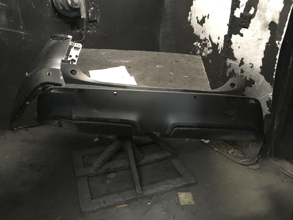 Rear bumper cover used genuine OEM Toyota RAV4 2019-2025
