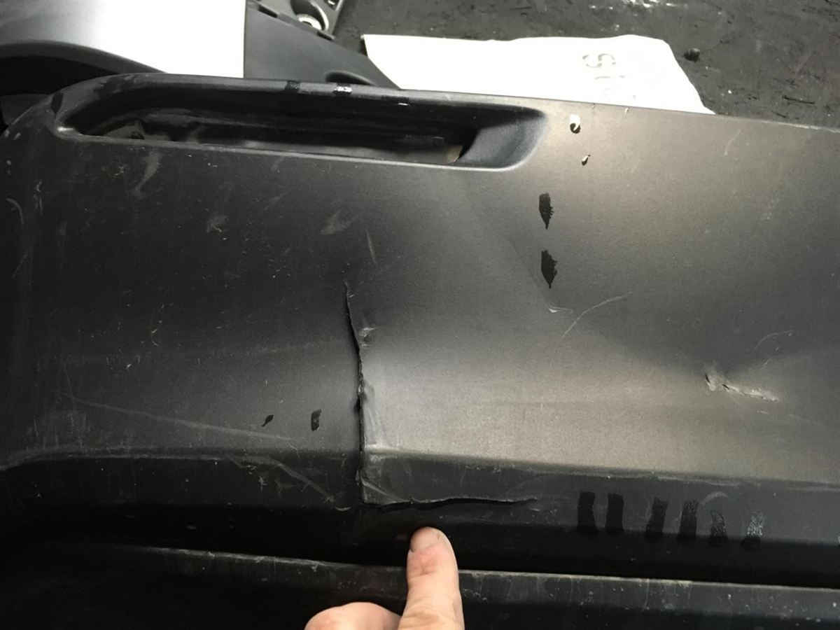 Rear bumper cover used genuine OEM Toyota RAV4 2019-2025