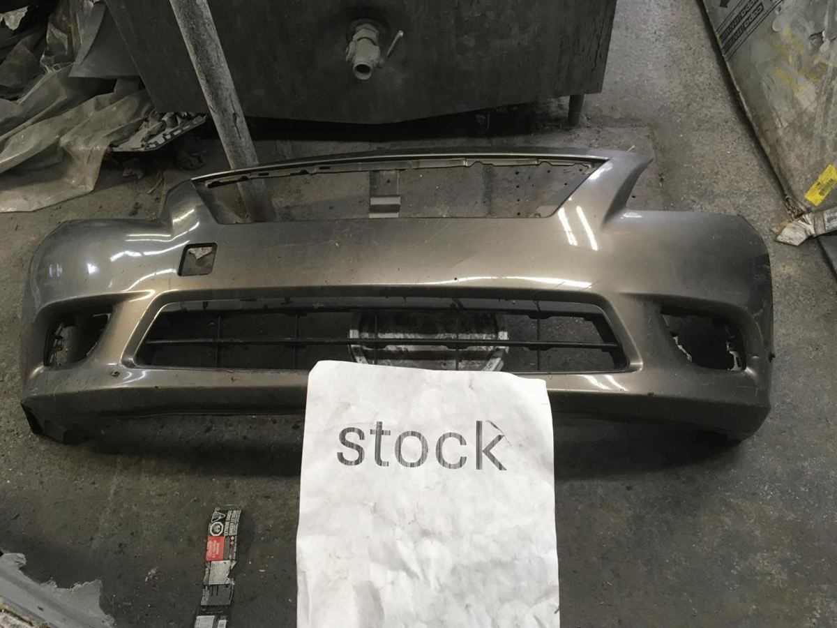 Front bumper cover used genuine OEM Nissan Versa 2013-2014