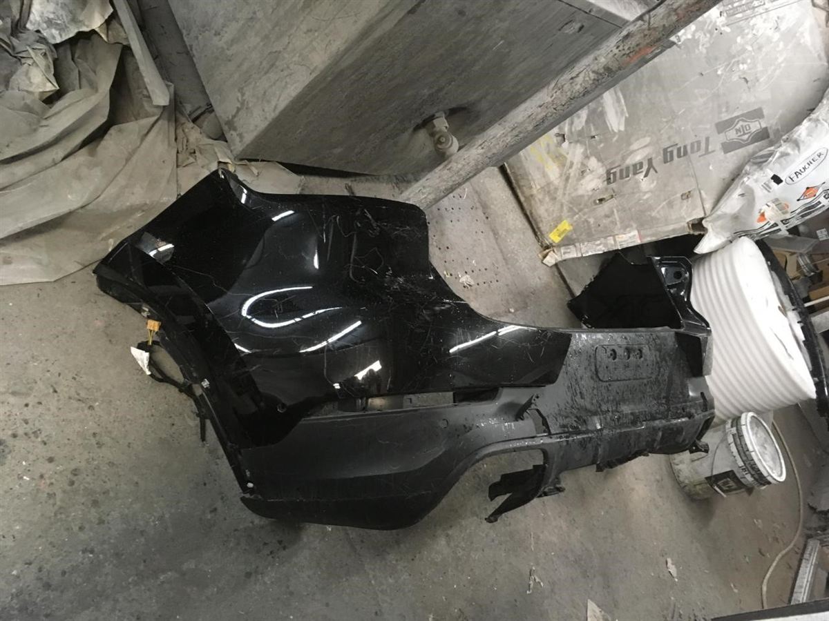 Rear Bumper assembly used genuine OEM