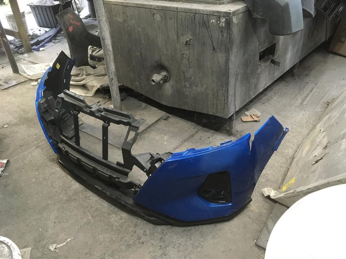 Left front bumper insert used genuine OEM Nissan Kicks 2021-2024
