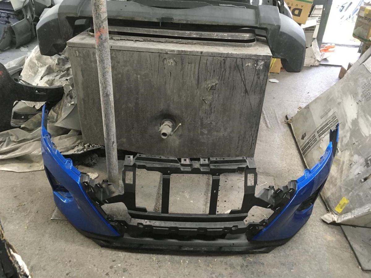 Left front bumper insert used genuine OEM Nissan Kicks 2021-2024