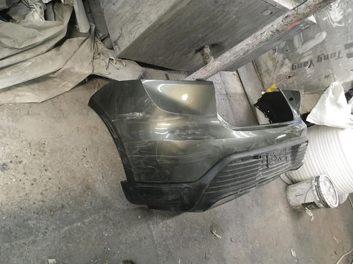 Rear Bumper assembly used genuine OEM