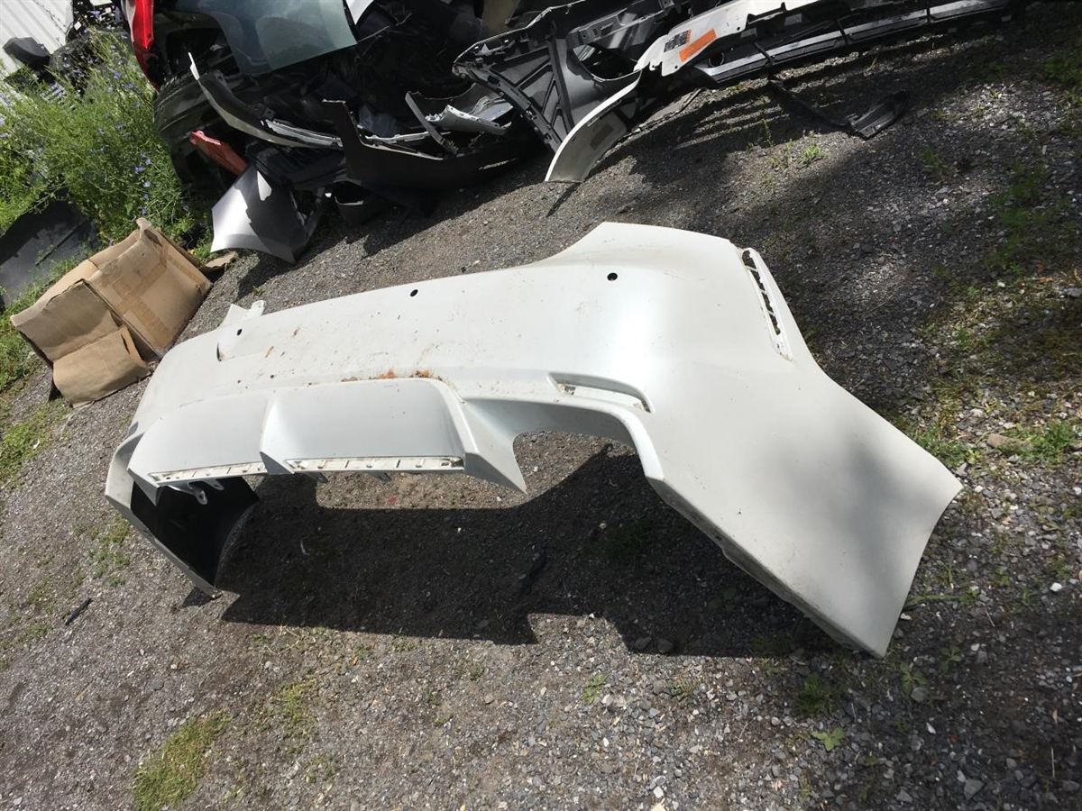 Rear bumper cover used genuine OEM Toyota Camry 2018-2024