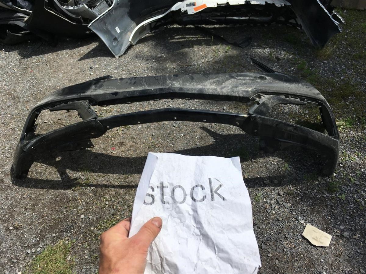 Front bumper cover used genuine OEM Acura TLX 2018-2020