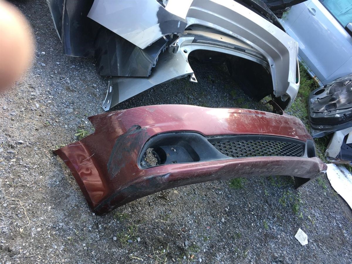 Front bumper cover used genuine OEM Dodge Grand Caravan 2011-2020