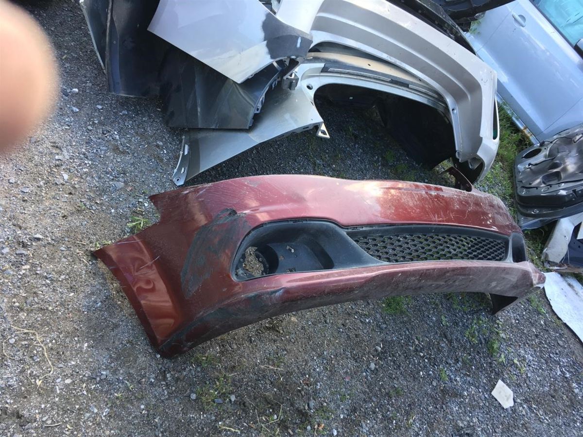 Front bumper cover used genuine OEM Dodge Grand Caravan 2011-2020