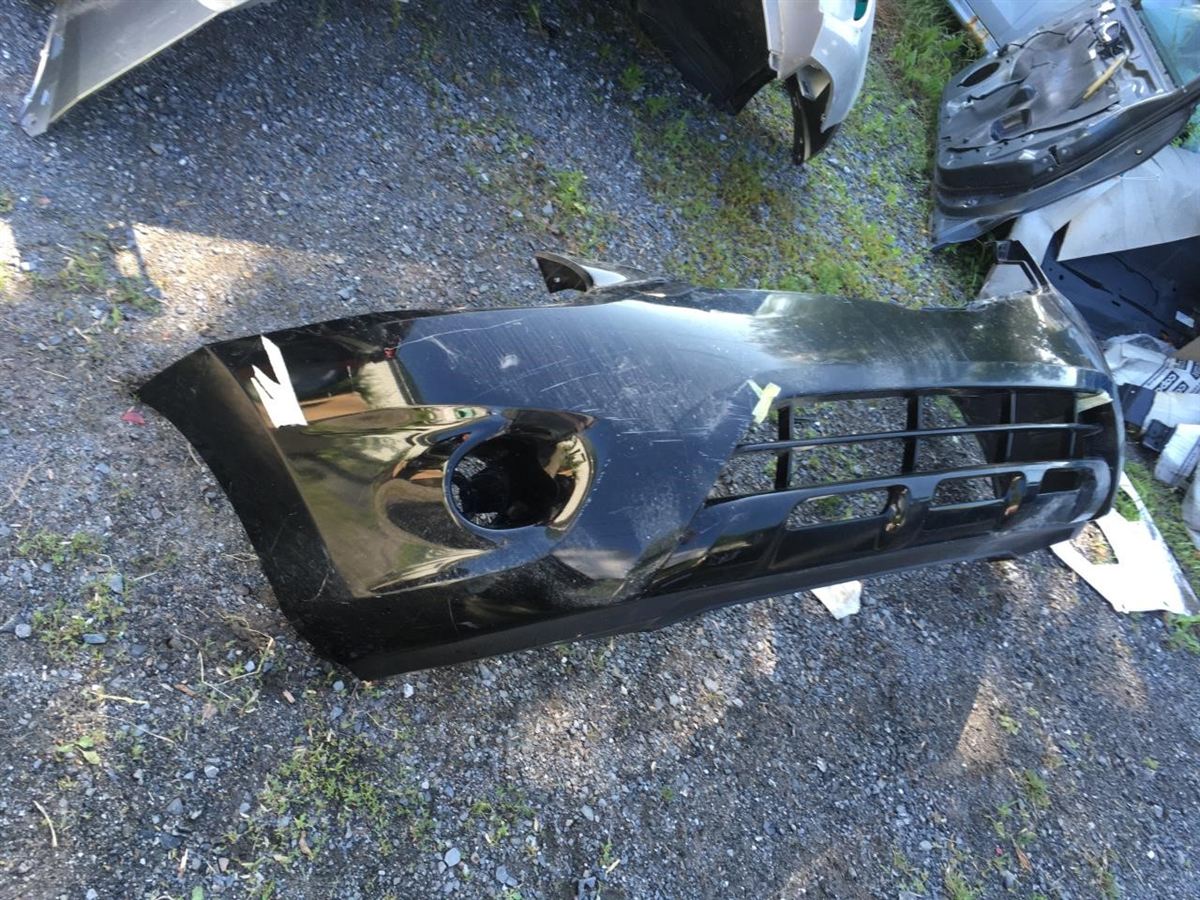 Front bumper cover used genuine OEM Nissan Rogue 2011-2013