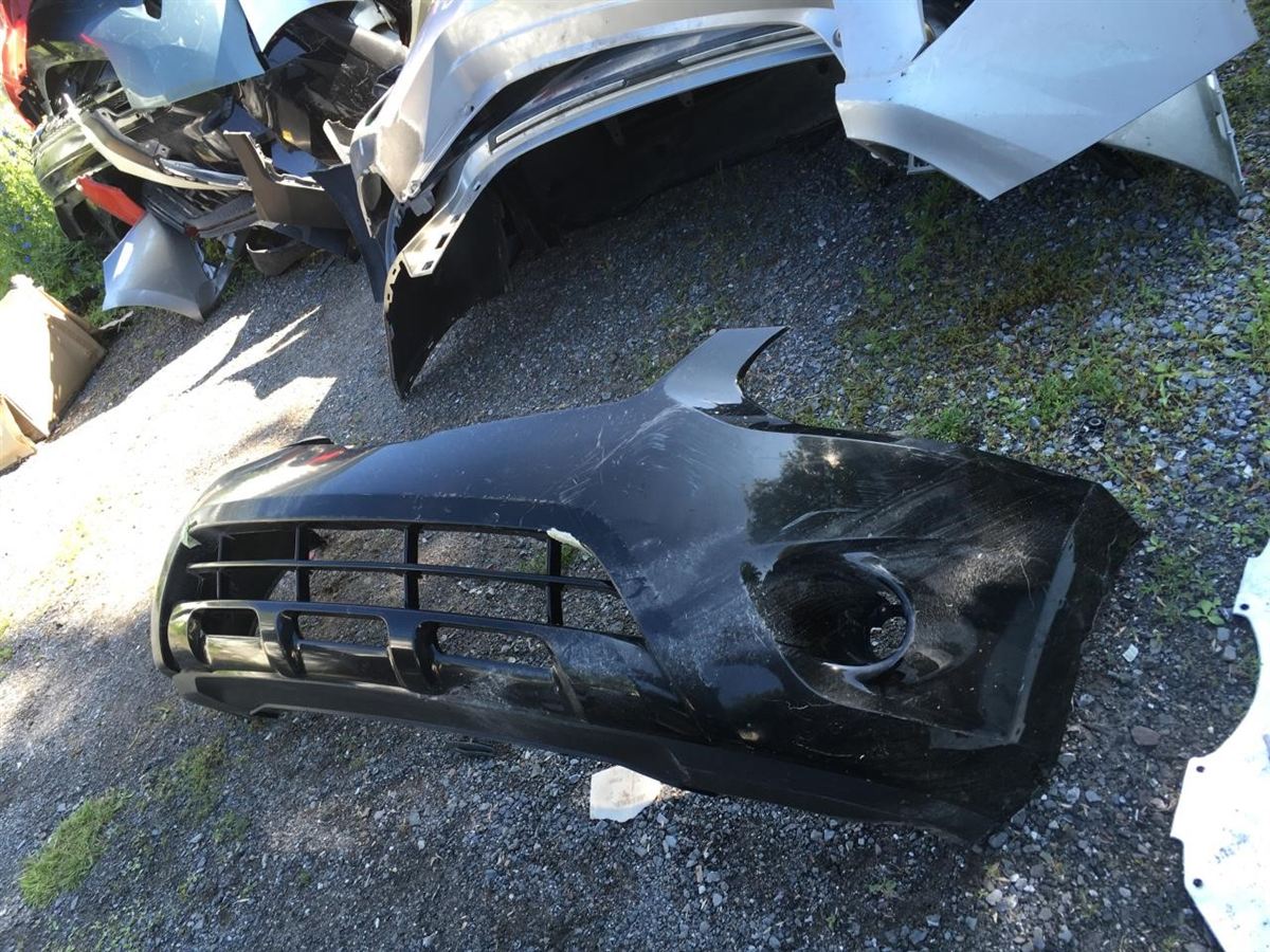 Front bumper cover used genuine OEM Nissan Rogue 2011-2013