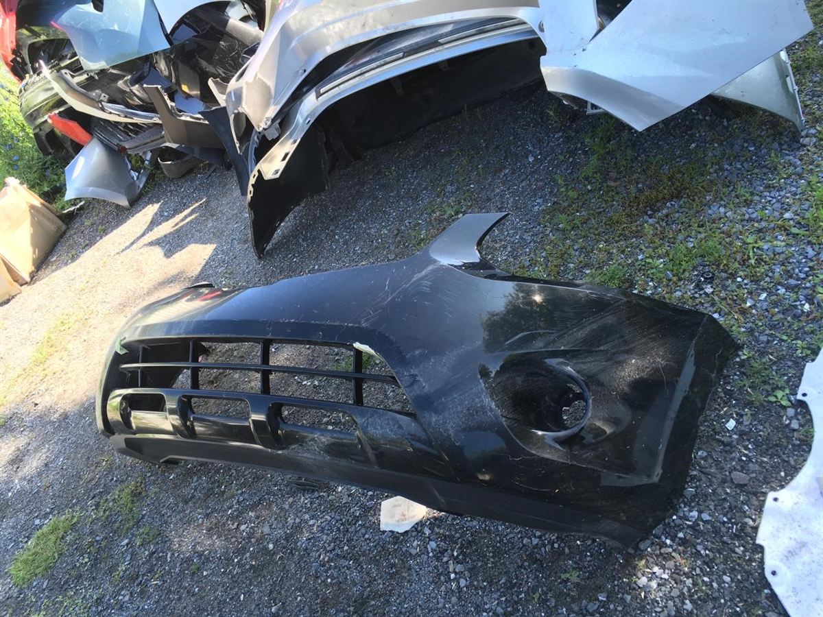Front bumper cover used genuine OEM Nissan Rogue 2011-2013