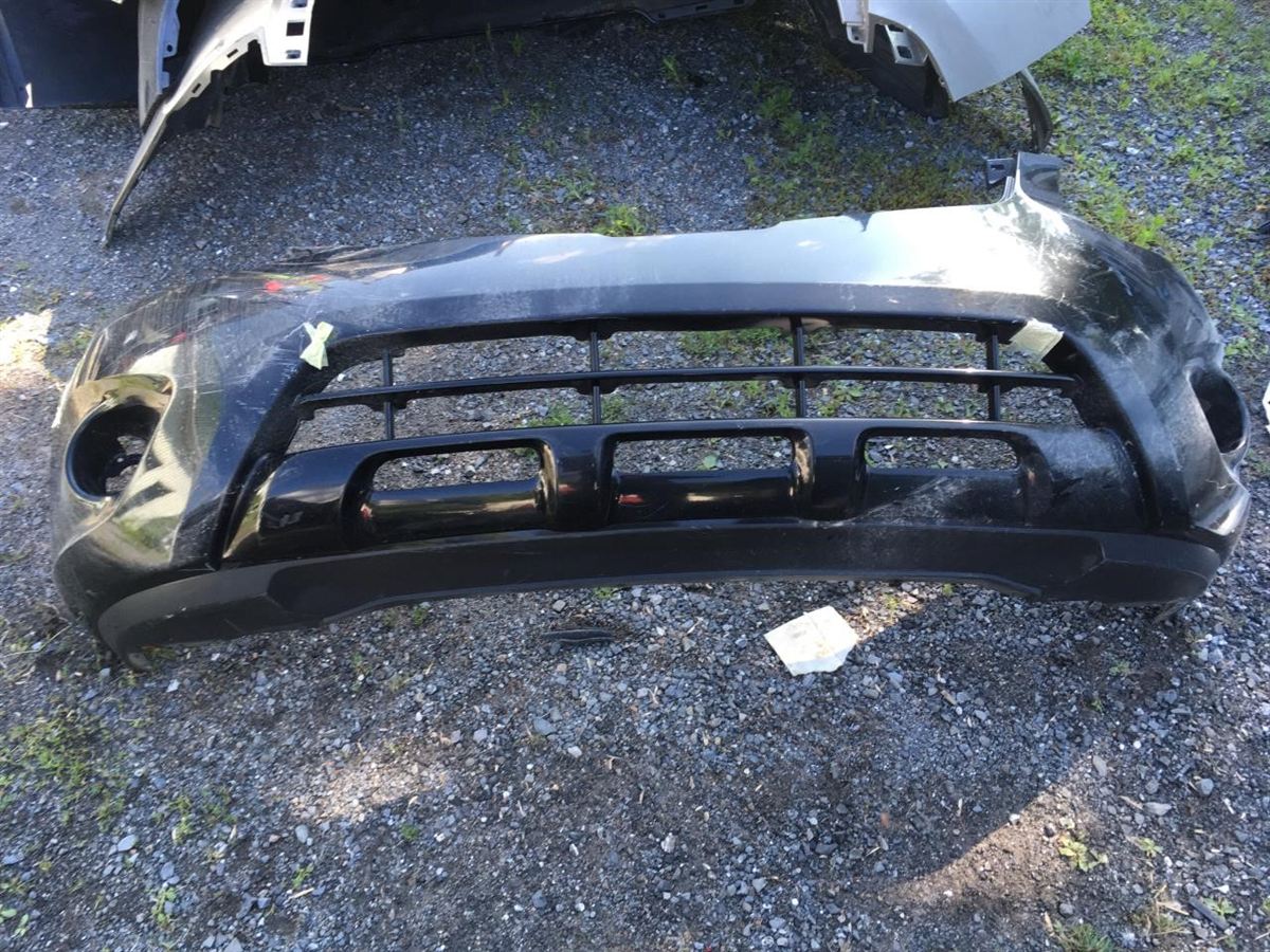 Front bumper cover used genuine OEM Nissan Rogue 2011-2013