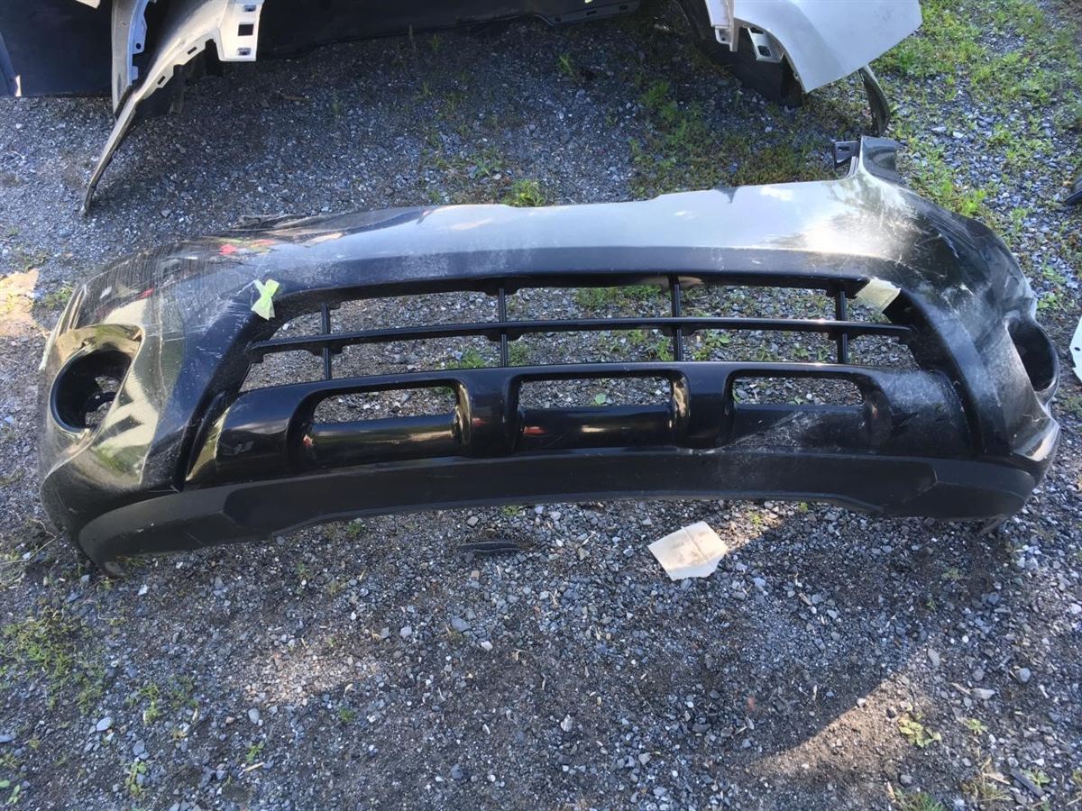 Front bumper cover used genuine OEM Nissan Rogue 2011-2013
